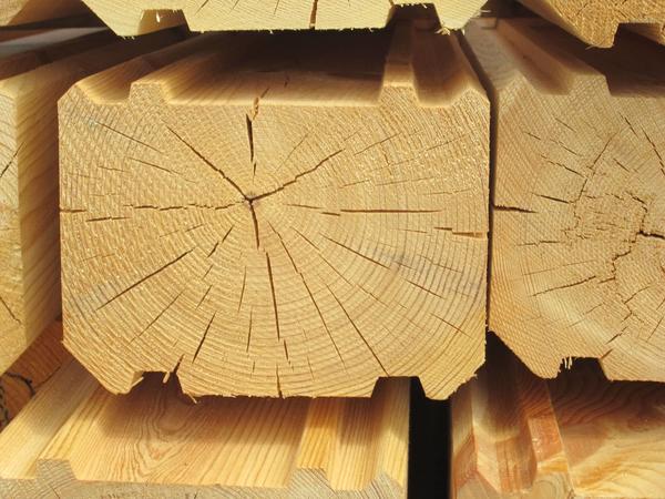 Из чего строить деревянный дом: из бруса или бревна?