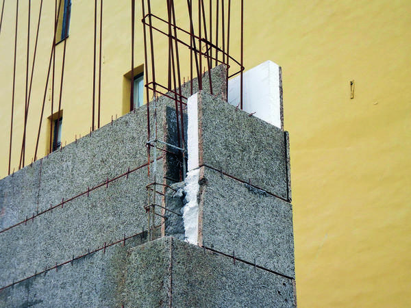 Возведение стены многоэтажного дома с помощью несъёмной опалубки «Велокс»